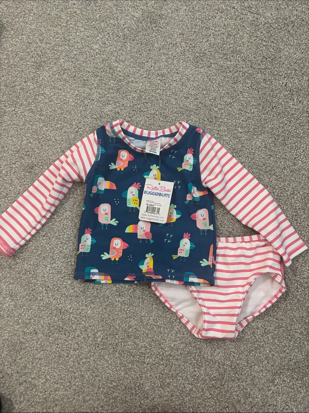 Ruffle Butts Navy Tropical Bird Rashguard Set with Pink Stripes